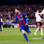 Messi scores a goal against Real Madrid in Laliga match between Barcelona and Valencia.