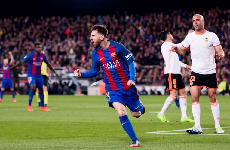 Messi scores a goal against Real Madrid in Laliga match between Barcelona and Valencia.